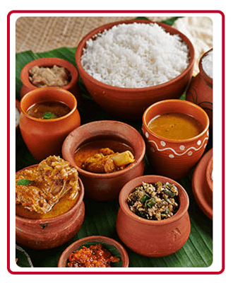 Everyday menu at a Chettinad restaurant featuring spicy curries, dosas, and traditional rice dishes served on a banana leaf.